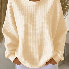 NYLA classic sweater in apricot waffle-knit, crewneck, long sleeves with ribbed cuffs.