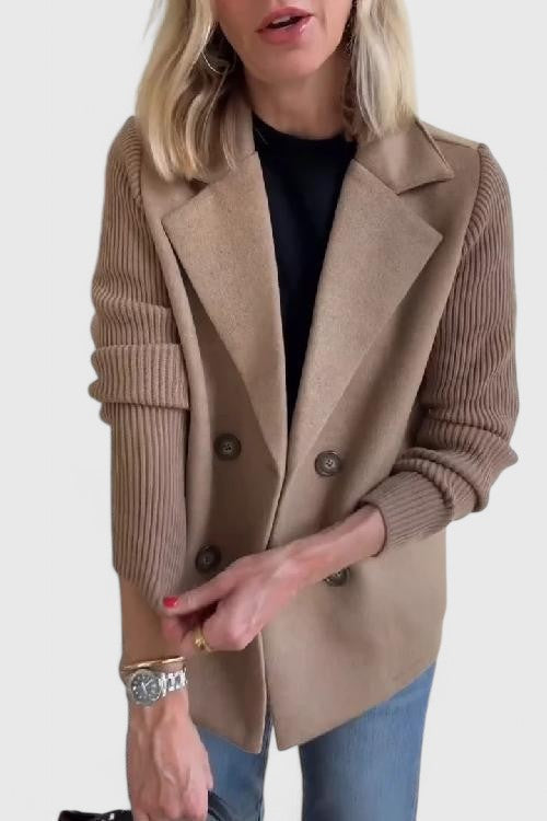 Beige blazer jacket with ribbed cuffs, notched lapels, and buttoned front
