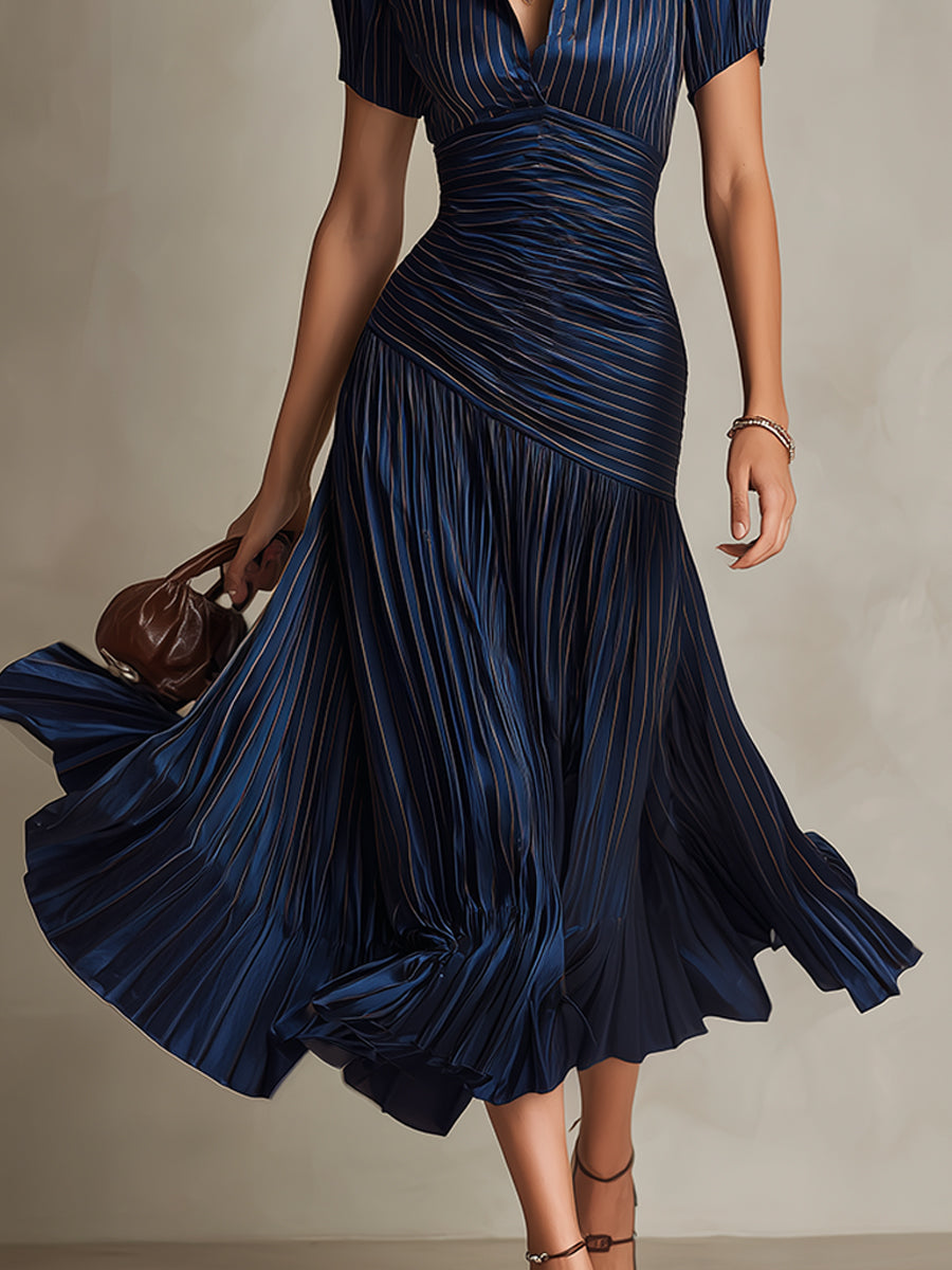 Dark blue striped satin midi dress with fitted bodice and pleated skirt