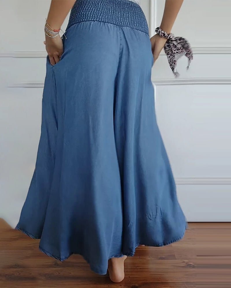 Blue relaxed-fit trousers, elastic waistband and gathered back yoke