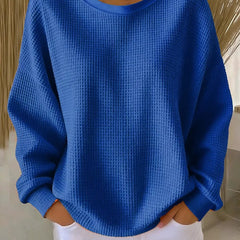 NYLA classic sweater in blue waffle-knit, crewneck, long sleeves with ribbed cuffs.