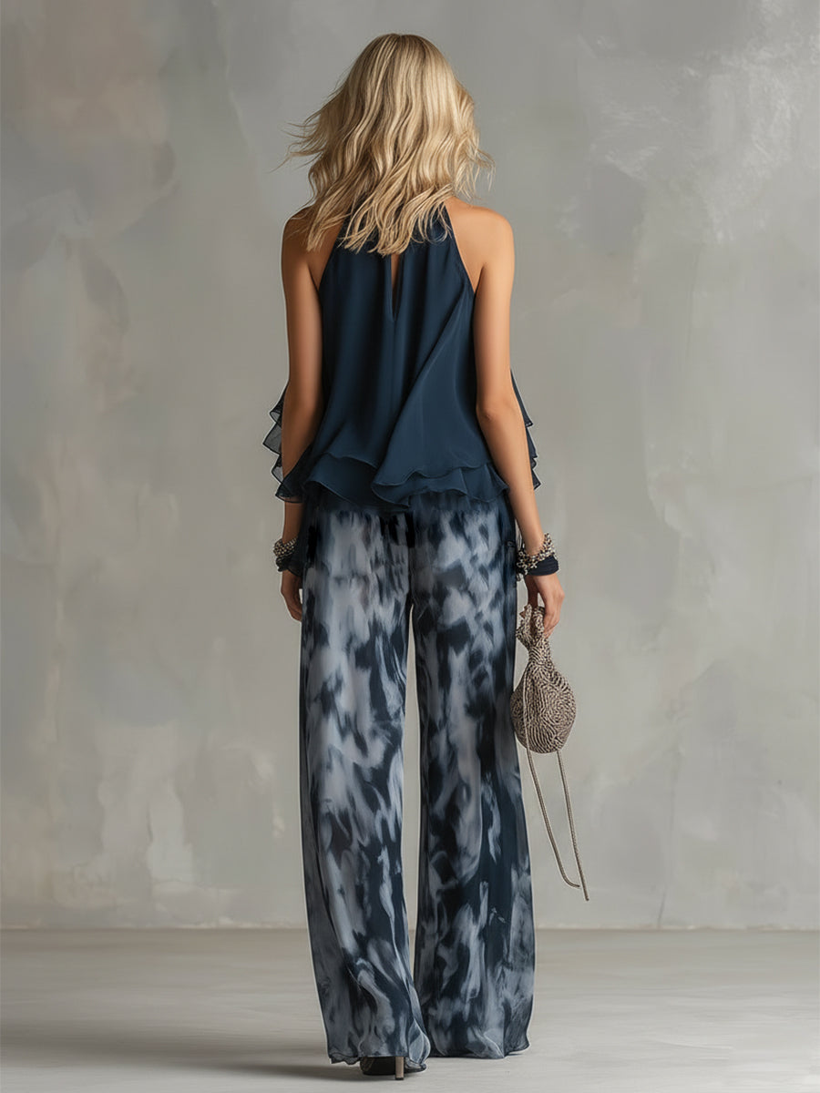 Two-piece halter ruffle top and wide-leg printed pants set, back view with layered hem