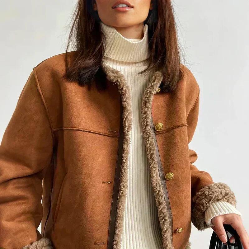 Brown suede jacket with sherpa lining and button placket, stand collar.