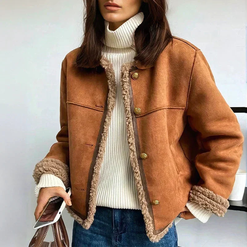 Brown suede sherpa-trim jacket with snap buttons and two chest flap pockets.