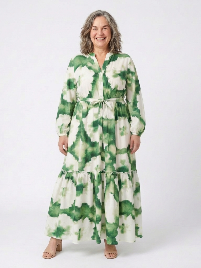Green-and-white tie-waist tiered maxi dress with long sleeves and V-neck floral print