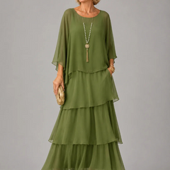 Green tiered maxi dress with loose dolman sleeves and scoop neckline, flowing layered tiers