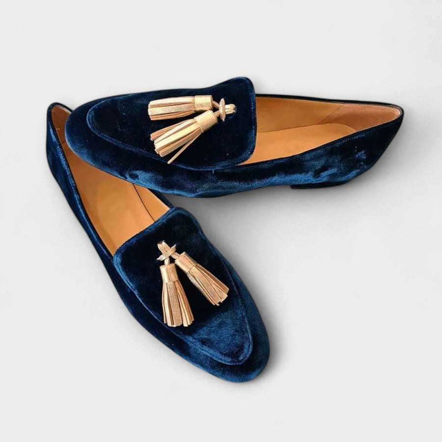 Dark navy velvet loafers with gold tassel ornament and low slip-on