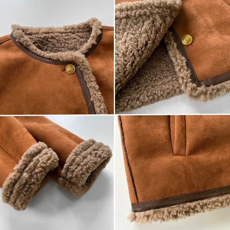 Close-up of brown suede jacket: sherpa collar, cuffs, and snap buttons.