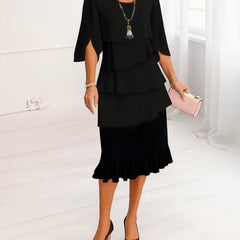 Black ruffle tier midi dress with short sleeves and layered flounce skirt