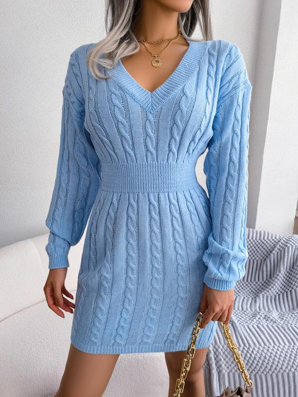 Light blue cable-knit sweater dress with V-neck and long puffed sleeves, fitted knit hem