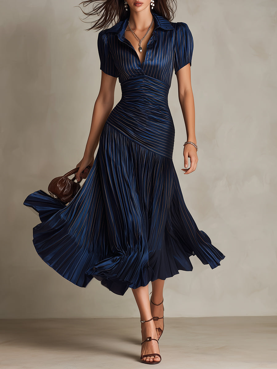 Dark blue striped satin midi dress with V-neck, ruched waist, short sleeves, full pleated skirt.