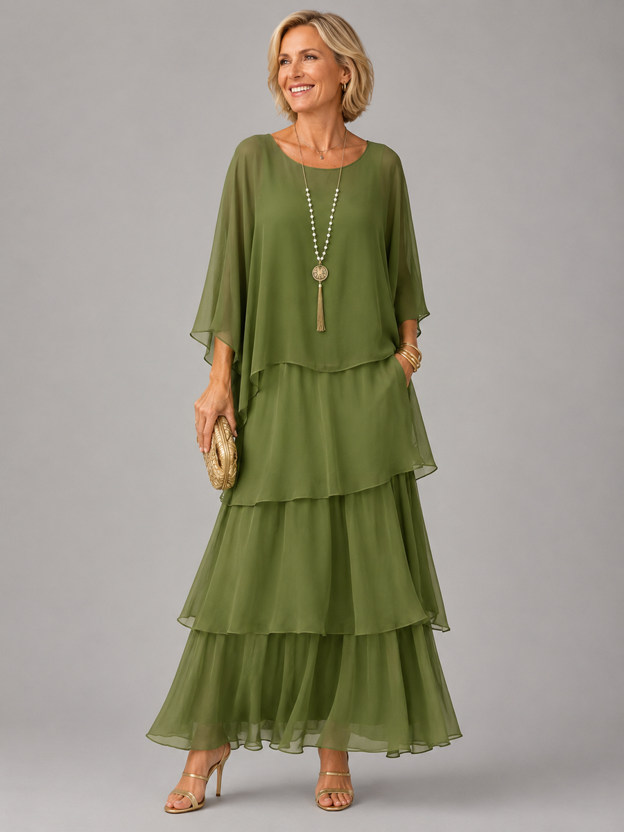 Olive green tiered maxi dress with draped sleeves and layered ruffles; long pendant necklace
