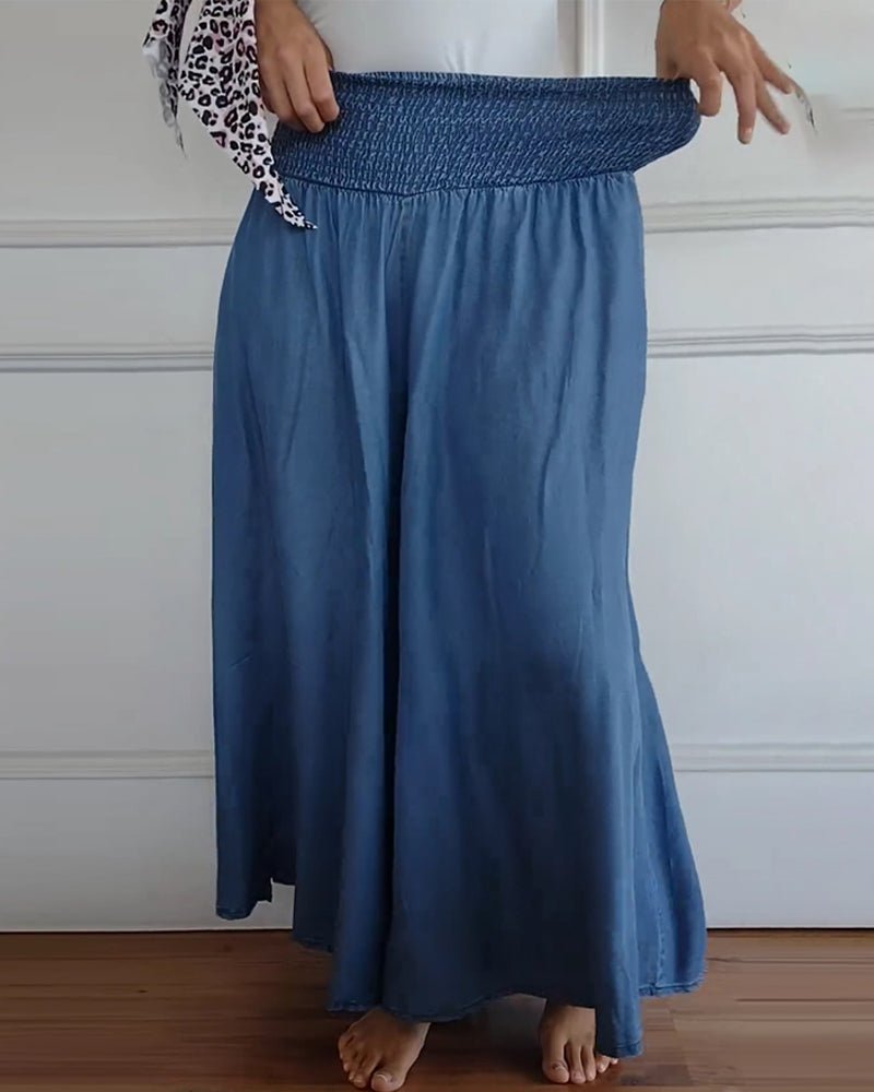 Blue relaxed-fit trousers with elastic waist and long, wide drape