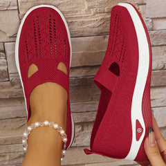 Red knit slip-on sneakers with side cutout and thick white sole