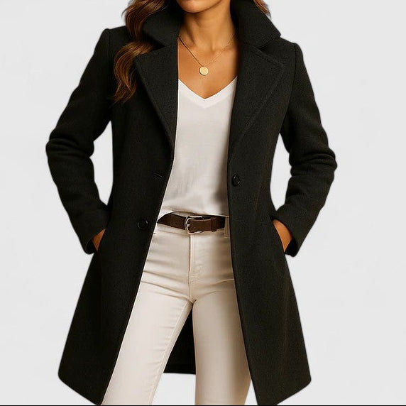 Black long tailored coat with notch lapels, button front, and side pockets