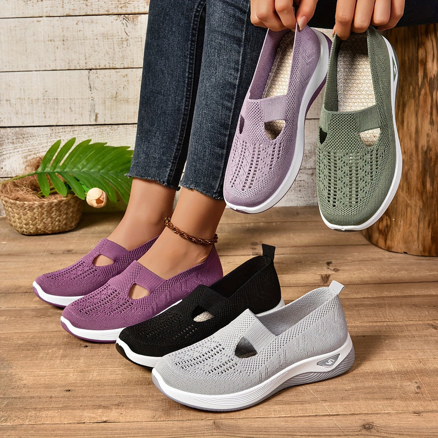 Purple knit slip-on shoes with side cutouts and white sole