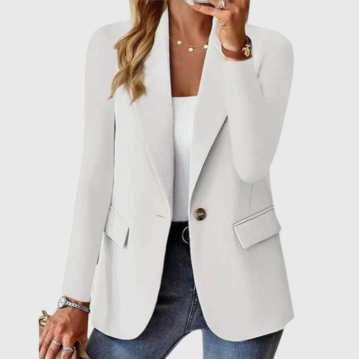 White blazer with notch lapel, single-breasted button closure, flap pockets.