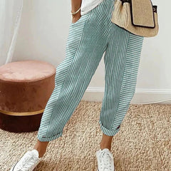 Lightweight striped trousers in green with cuffed ankle hem and relaxed legs