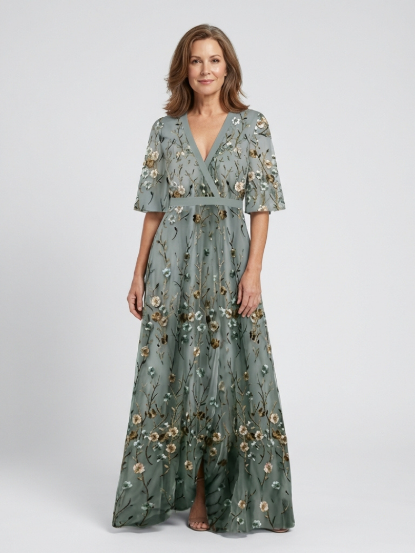 Floral V-neck maxi dress in muted green with short flutter sleeves and gathered skirt