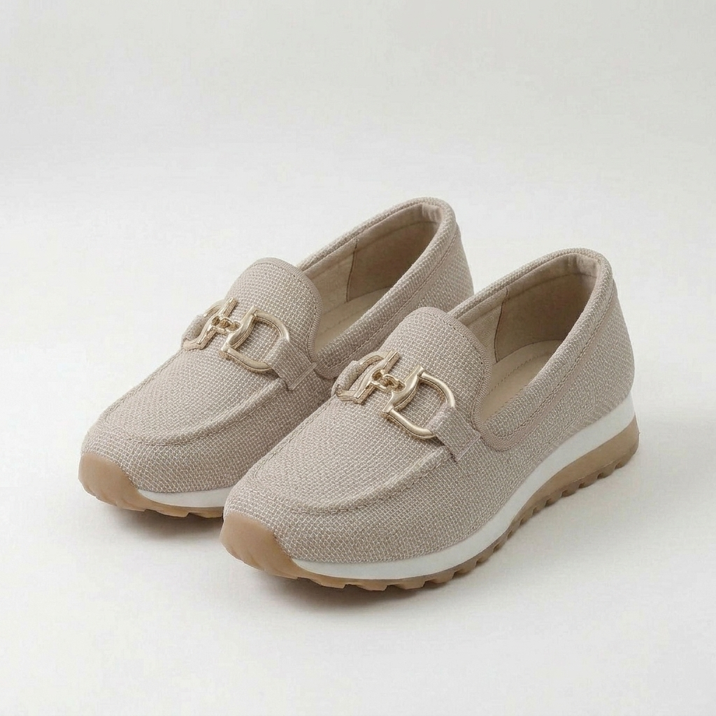 Beige orthopaedic loafer sneakers with gold buckle detail and textured knit upper