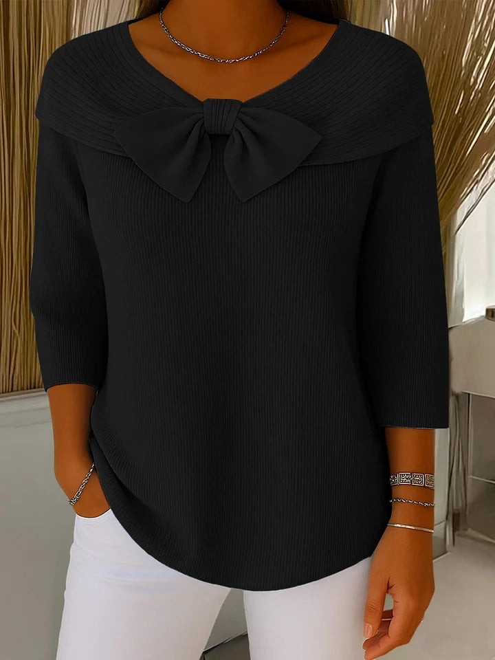 Black sweater with round neckline bow and three-quarter sleeves