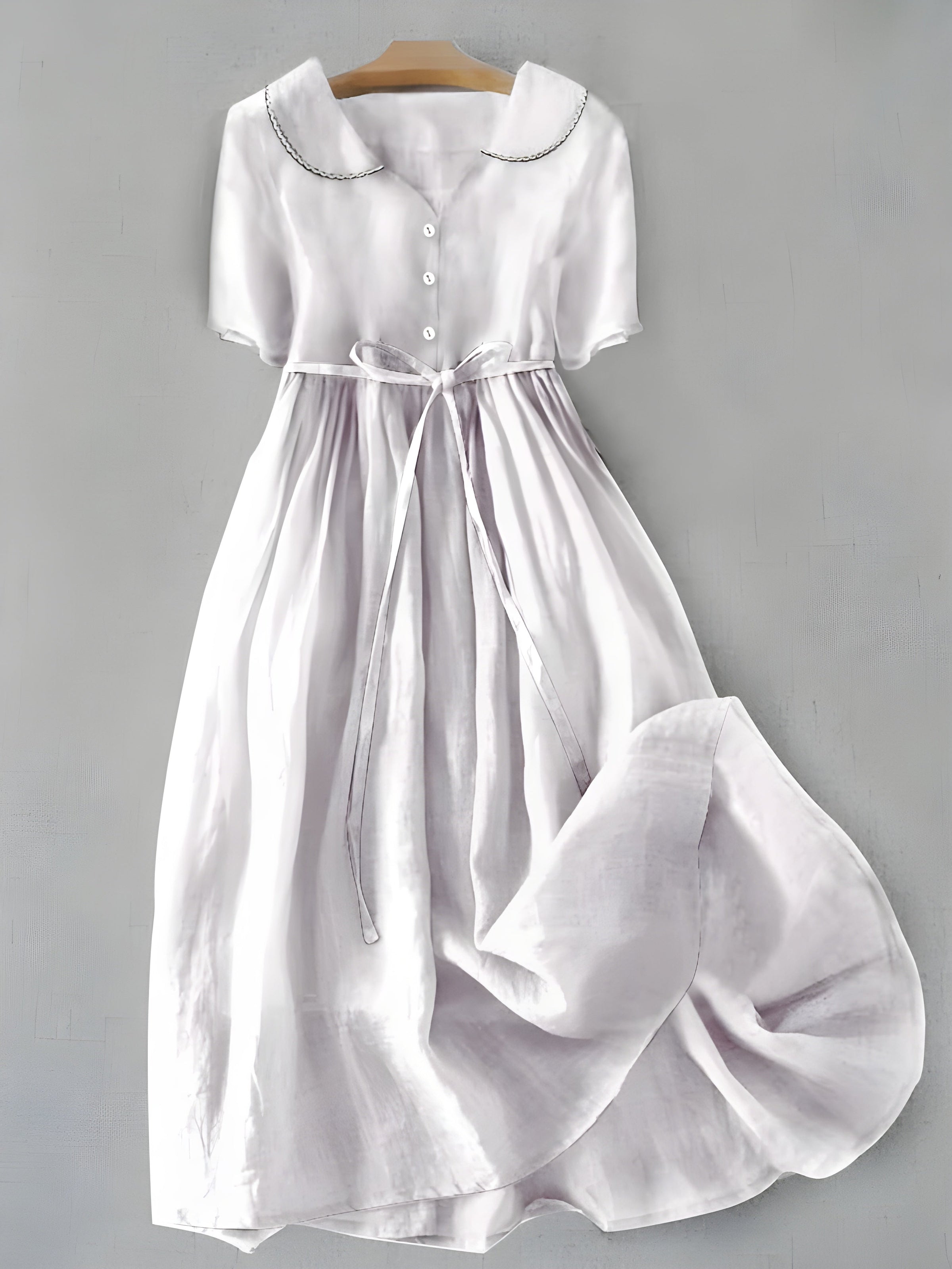 Light purple classic dress with button-front bodice, gathered skirt, drawstring waist tie