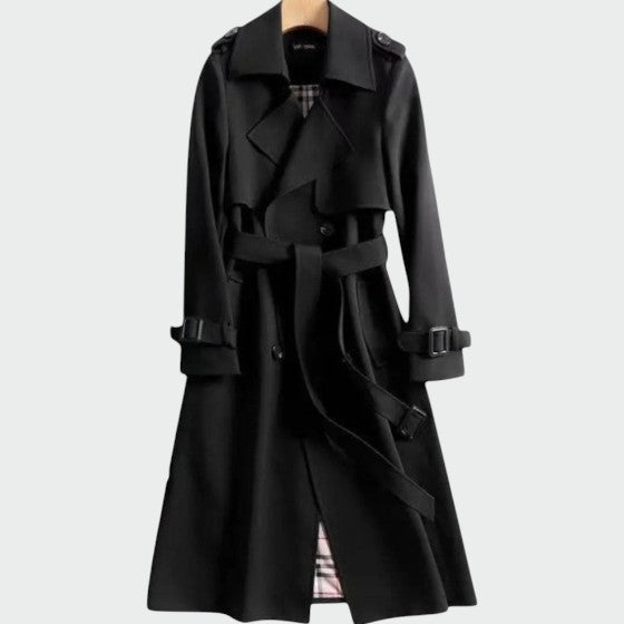 Black trench coat front close-up with belt straps, buttoned placket, and shoulder epaulets