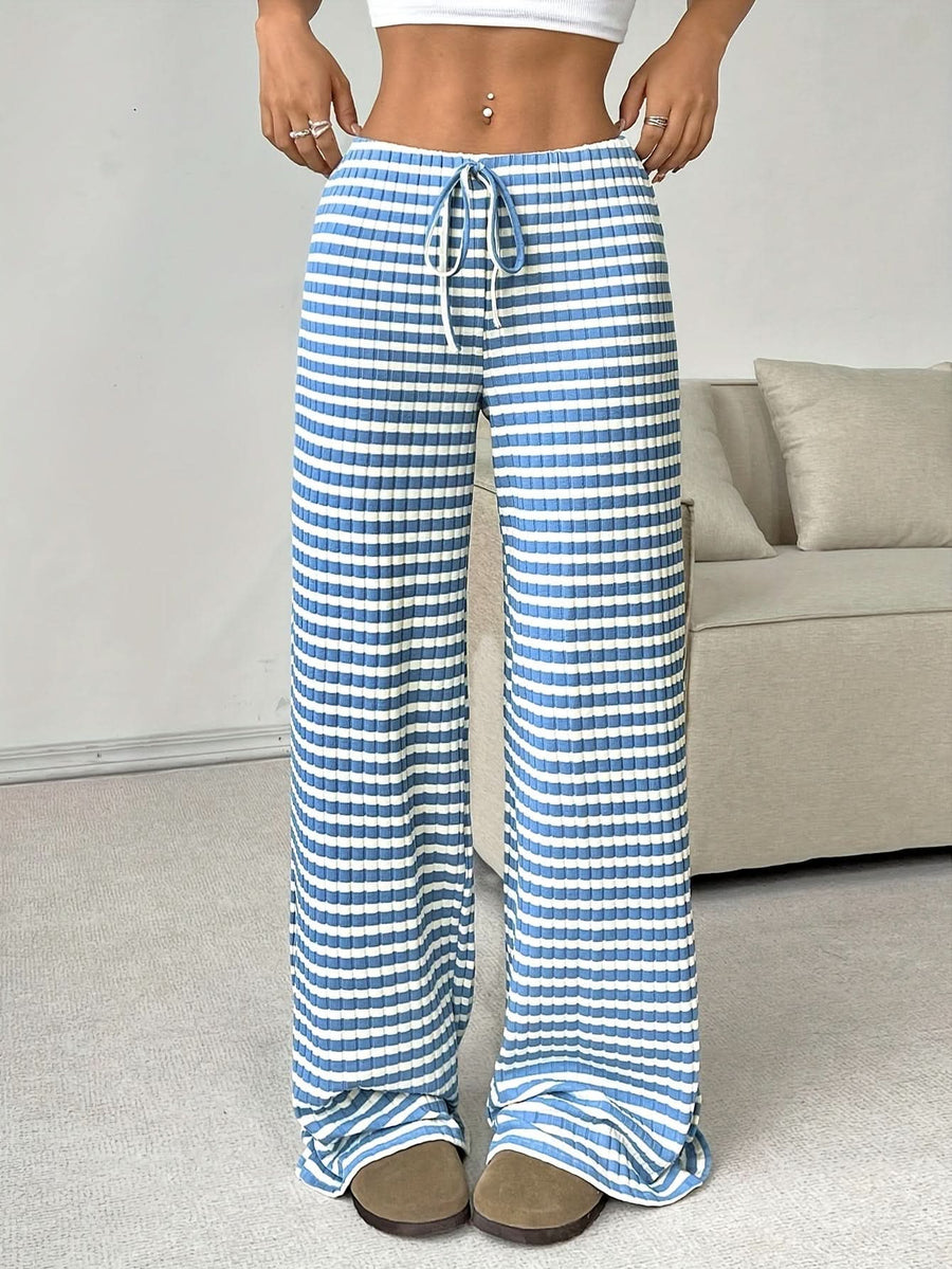 Blue striped wide-leg lounge pants with drawstring tie and elastic waist, full front view.