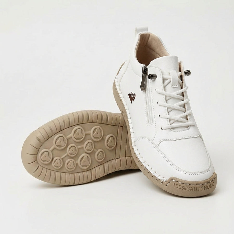 White side-zip trainers with lace-up front and cushioned sole