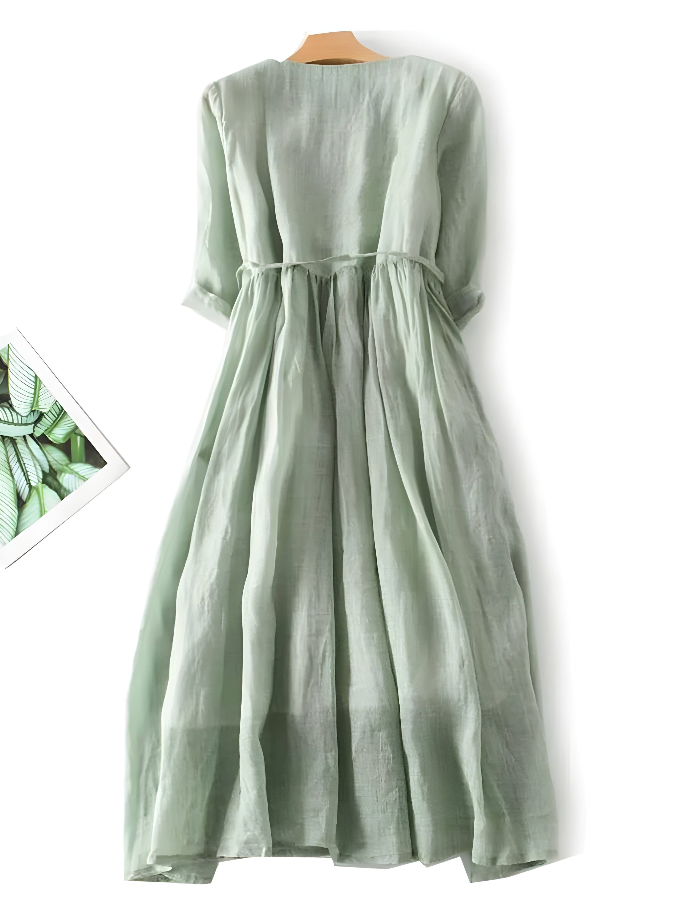 Amara vintage dress in sage green, pleated skirt and ribbon-tied waist with short sleeves
