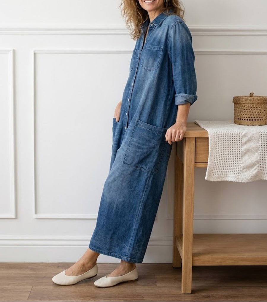 Washed blue denim button-through dress with collar, long sleeves, and front patch pockets