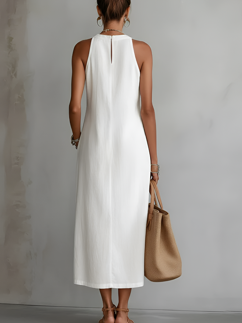 Relaxed embroidered midi dress in white, sleeveless back view with keyhole detail