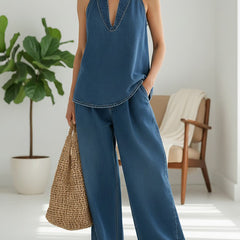 Blue washed denim sleeveless V-neck top with matching wide-leg pants two-piece set