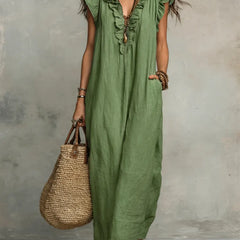 Vestito lungo bohémien Camélia verde con scollo a V e balze sulle spalle