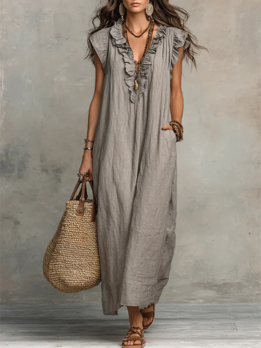 Vestito lungo bohémien Camélia grigio con scollo a V e balze sulle spalle