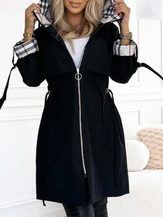 Black waterproof zip coat with hood, plaid-trim cuffs, and drawcord waist ties