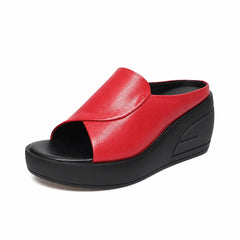 Red orthopaedic slip-on wedge sandals with open toe