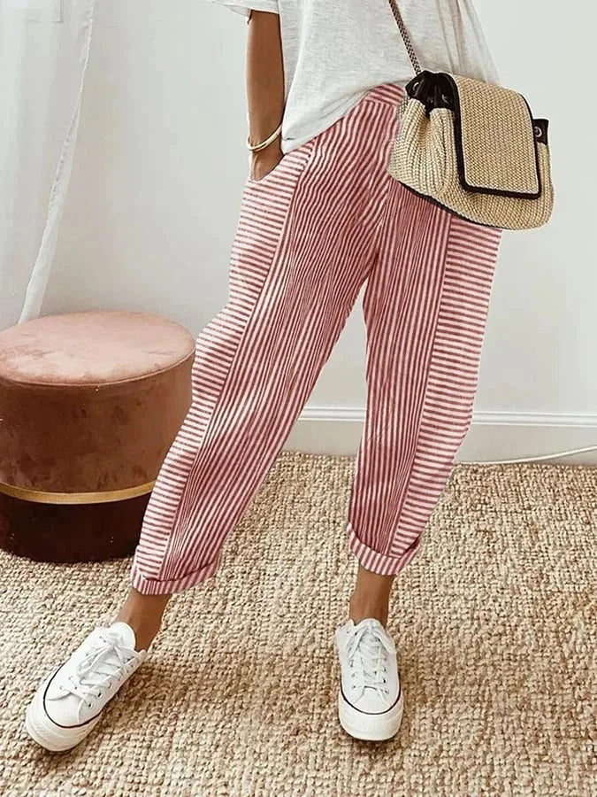 Classic striped trousers, red with white vertical stripes and cuffed hems