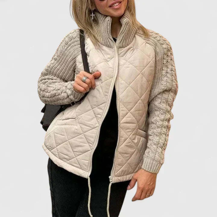 Quilted zip-up jacket in beige with knit sleeves and stand collar