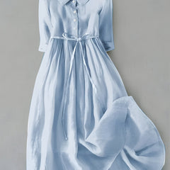 Light blue Grace dress with button front, V-neck, short sleeves, tied waist, gathered skirt