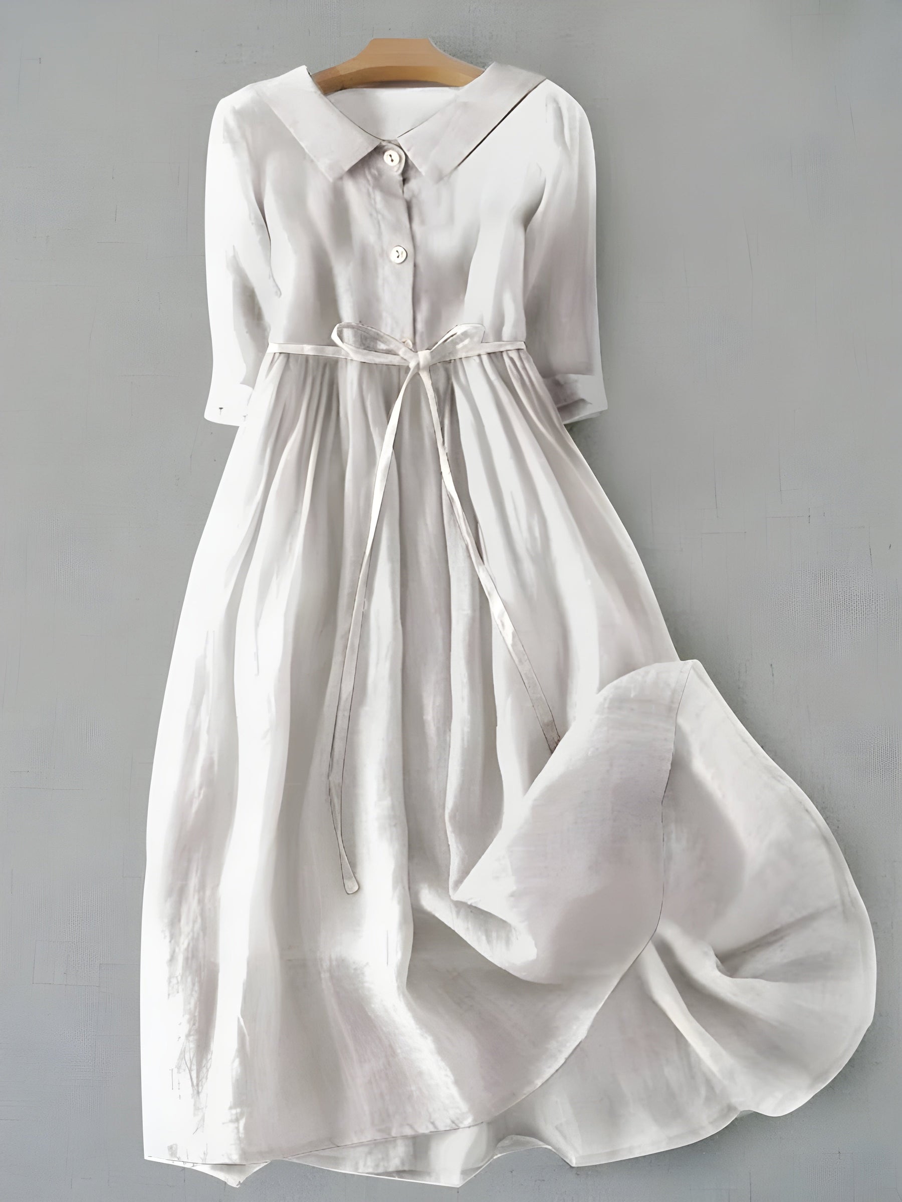 White Grace dress with button front, V-neck, short sleeves, tied waist, gathered skirt