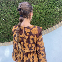 Women’s floral long-sleeve dress, open back with bow detail, mustard and dark brown