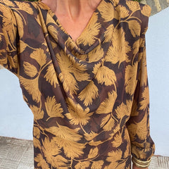 Floral V-neck long-sleeve dress front, dark brown with golden yellow leaf print